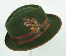 Forest green velour trilby with ribbon and feather trim.