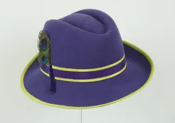 Violet velour trilby trimmed with peacock feathers and lime ribbon